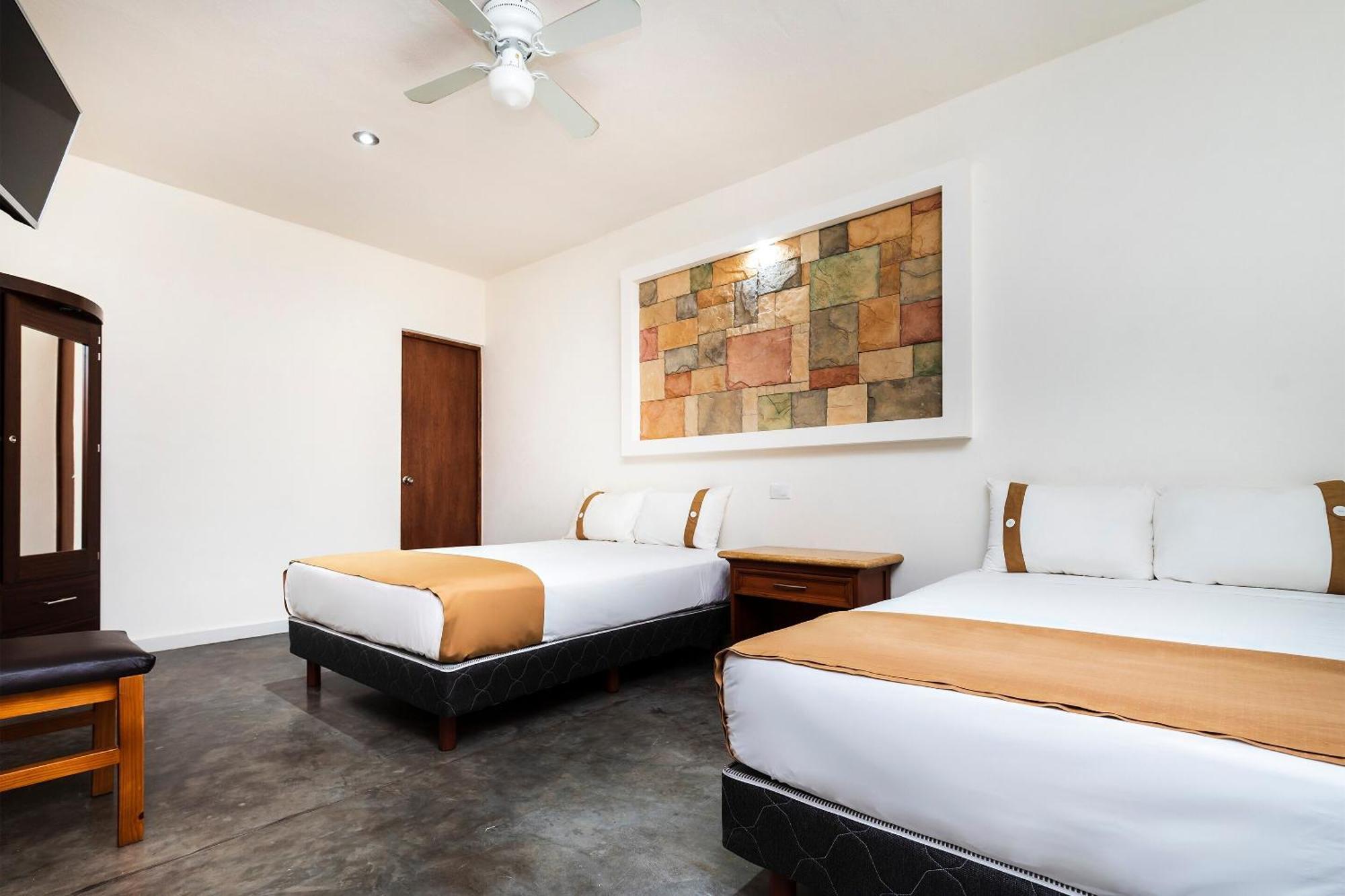 Capital O Hotel Joyma Suites, San Luis San Luis Potosí Екстериор снимка