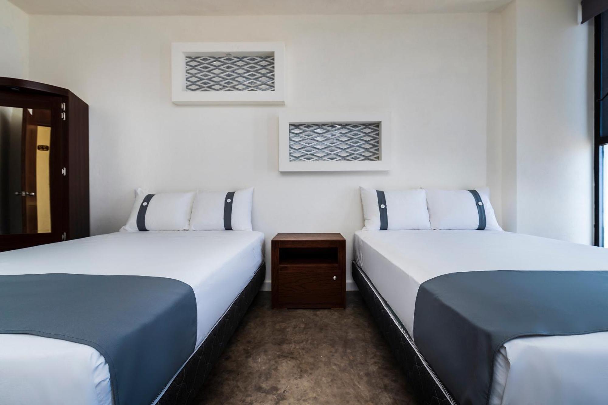 Capital O Hotel Joyma Suites, San Luis San Luis Potosí Екстериор снимка